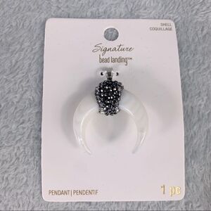 Michaels signature bead landing shell horn pendant